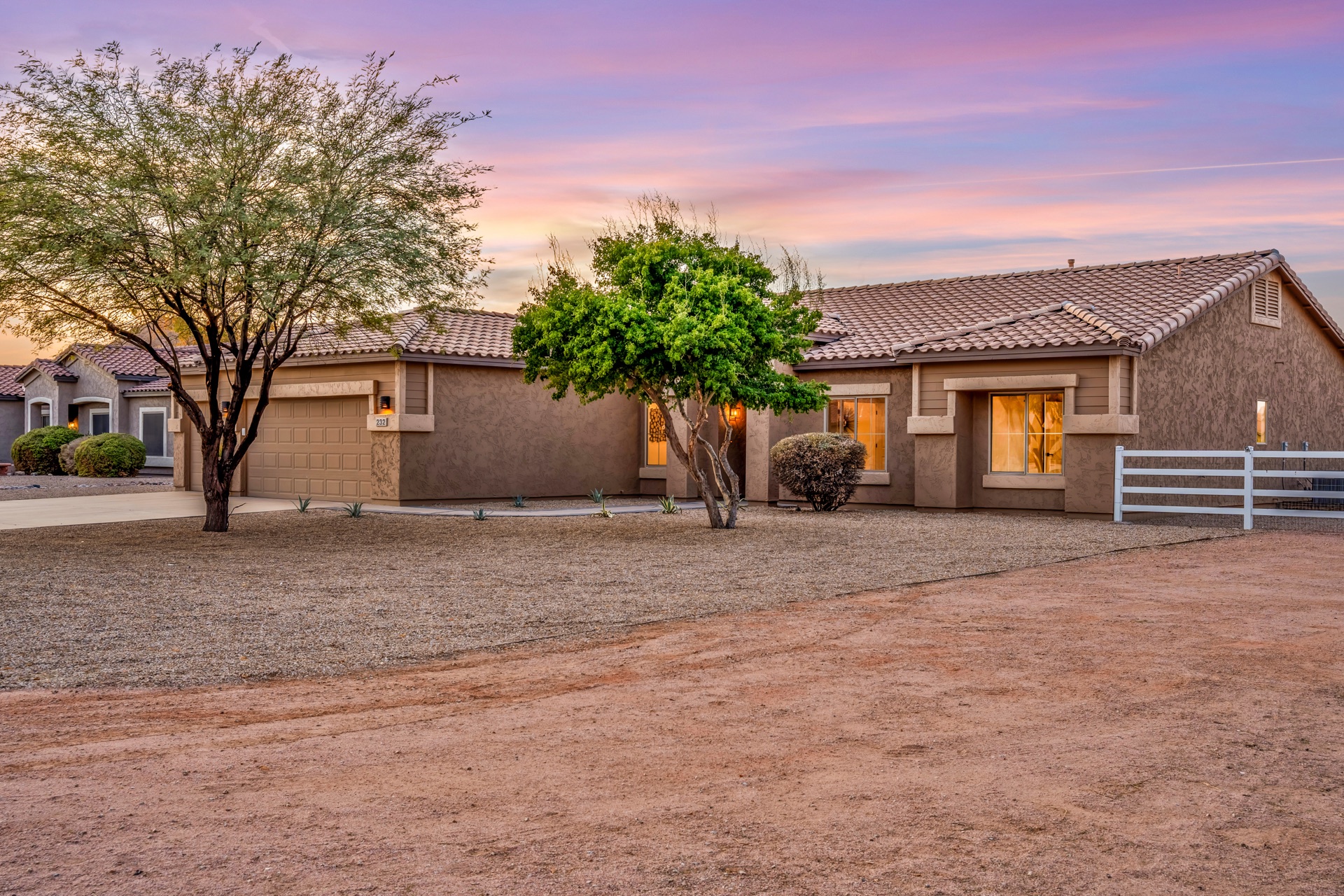 Property at twilight with golden hour lighting