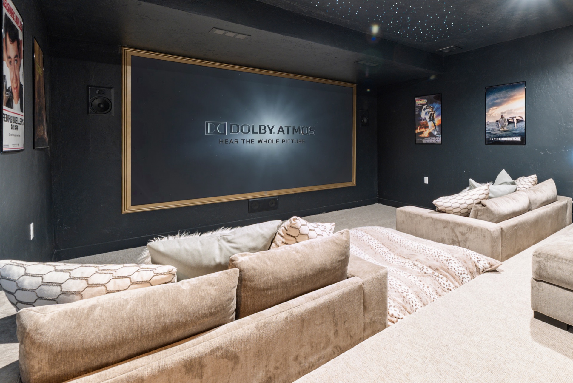 Home theater room with Dolby Atmos and plush seating