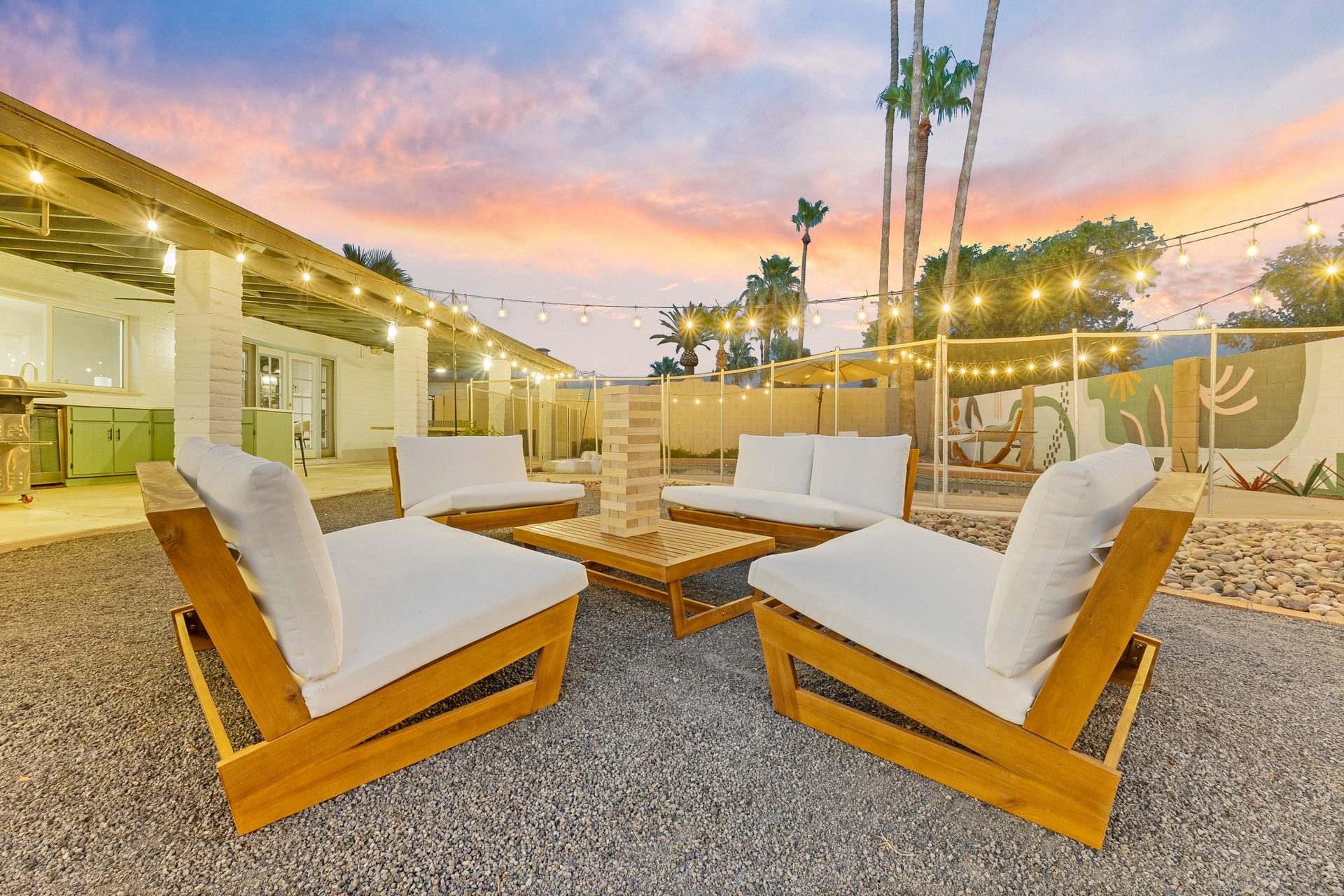 Outdoor lounge under string lights at dusk, Tempe